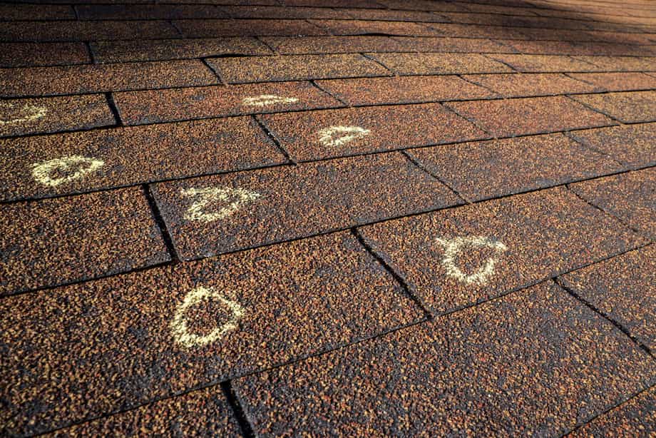 shingle roof hail damage marked out for fixing